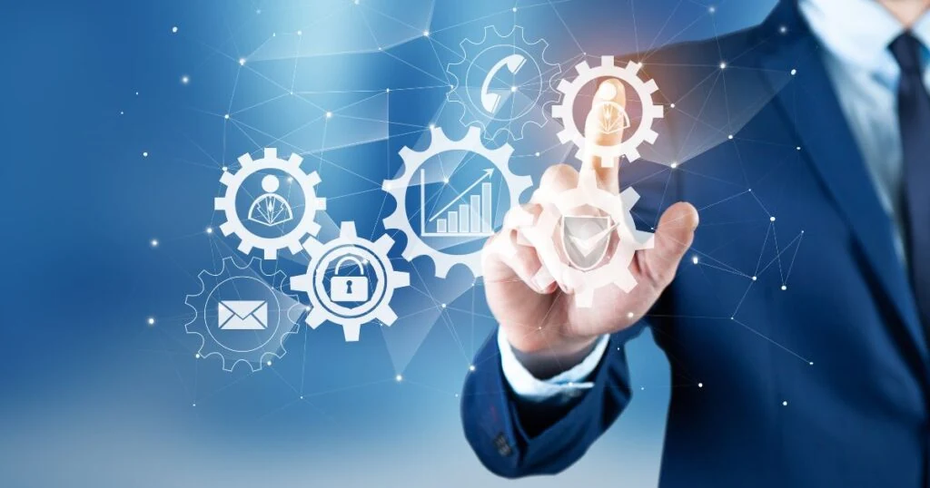 man pointing at workflow automation icons